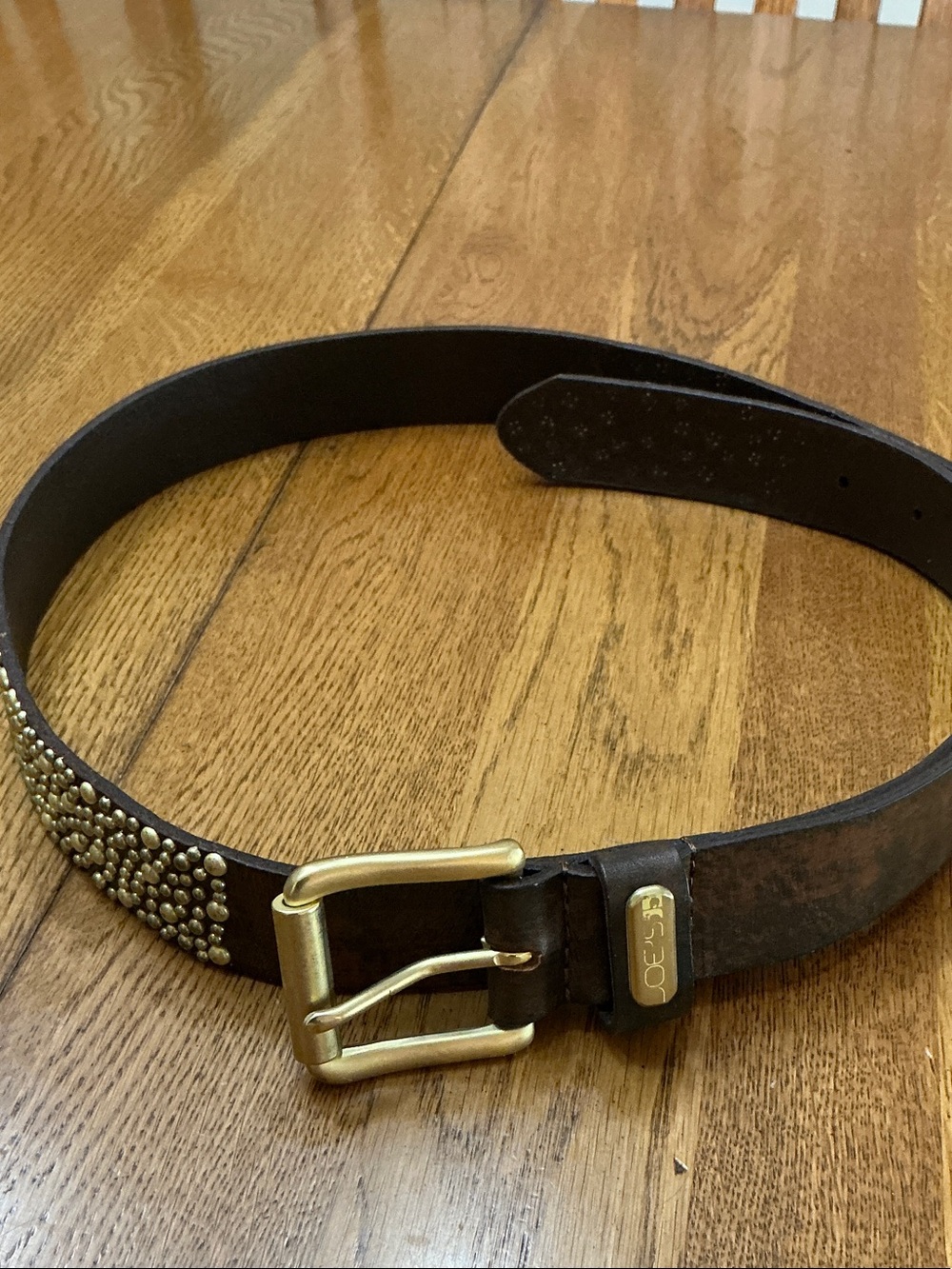 Woman’s Joe’s Jeans leather belt with brass studs. Medium. 43.5” long. Like new